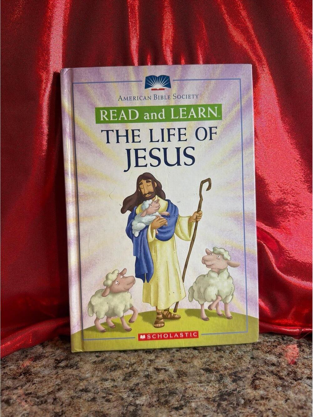 hardcover copy of "Read and Learn: The Life of Jesus" by Eva Moore, published by